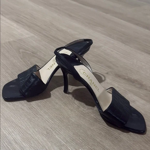 CHANEL Black Sandals with Slingback Design